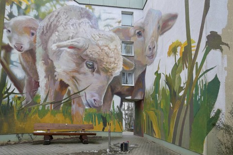 Mural sheep by CASE maClaim 2022, graffiti, street art, sheep figures, dandelion, meadow with