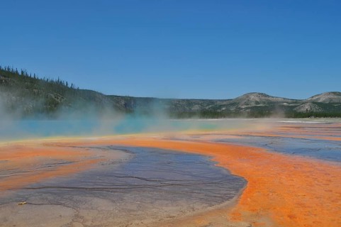 Extensive, colorful geothermally active area under clear skies, Grand Prismatic Spring, Yellowstone