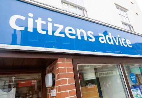 Citizens Advice charity office sign on High Street shopfront, Beccles, Suffolk, England, UK