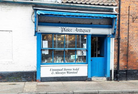 Shop window shopfront of small specialist antique shop, Plaice Antiques, Beccles, Suffolk, England,