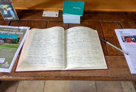 Visitor's book inside church of Saint Michael, Beccles, Suffolk, England, UK