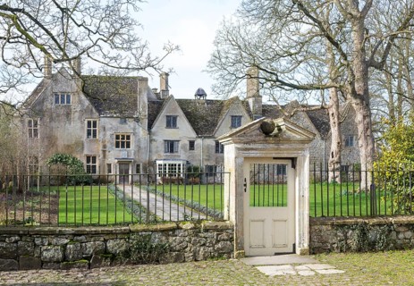 Railings and doorway of historic manor house building, Avebury Manor, Wiltshire, England, UK