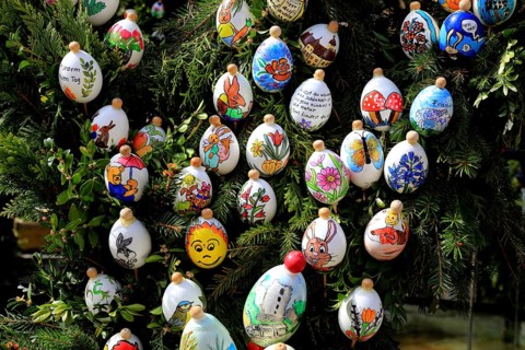 Detail, eggs painted by children, comic characters, Easter fountain in Heiligenstadt, Franconian