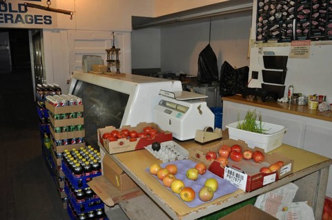 An ancient shop counter with fresh fruit, vegetables and preserves ready for sale, Mitchell,
