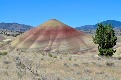 Colourfully patterned hills with intense geological discoloration, clear lines, John Day Fossil