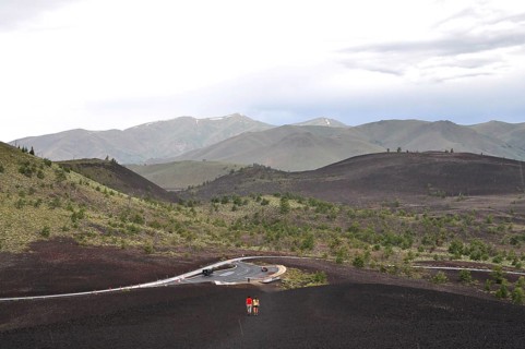 Road snakes through volcanic hills, Craters of the Moon National Monument, Idaho, USA