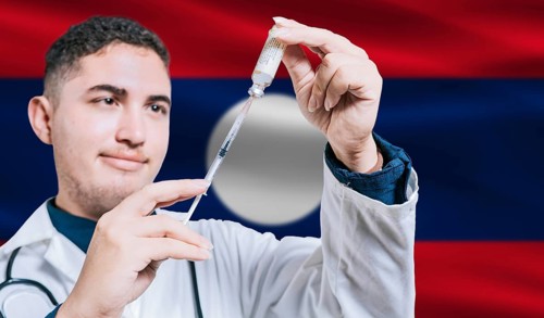 Doctor holding syringe on Laos flag background. Medical professional holding syringe with Laotian
