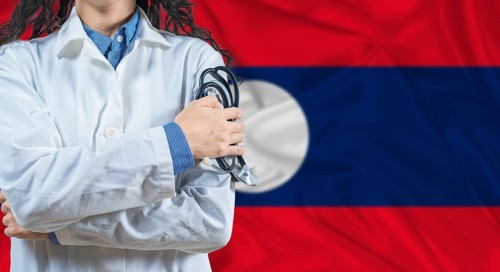 Healthcare professional with Laos flag background. Professional doctor holding stethoscope on Laos