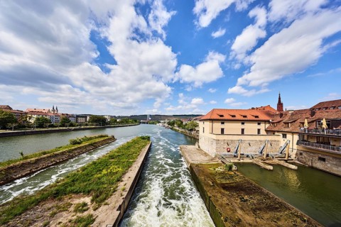 River Main, barrage, general architecture, hilly landscape, forest, total blue sky, cumulus clouds,