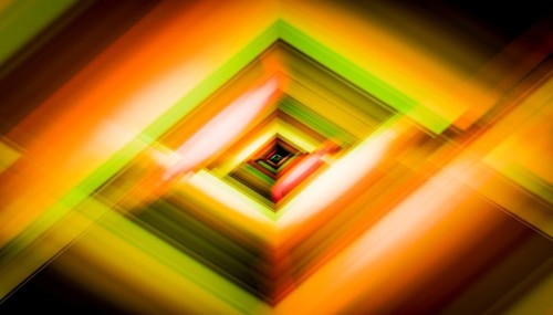 This digital artwork features a 3D render of a geometric tunnel with vibrant, blurred colors that
