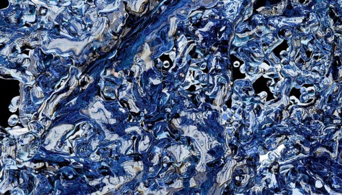 A captivating abstract image showcasing intricate details of blue water textures. The interplay of