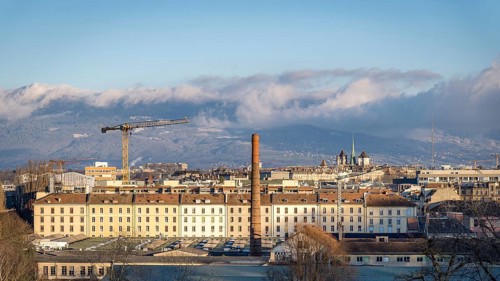 A picturesque view of Geneva, Switzerland, showcasing the city's architecture with the majestic