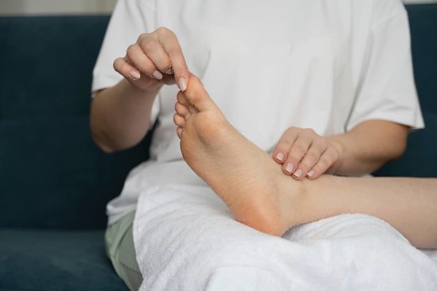 A mother and daughter relax at home, enjoying a self-care day together. They focus on wellness and