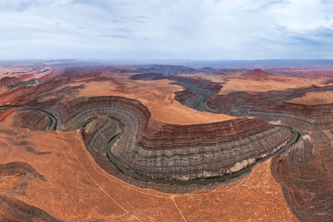 Panoramic aerial view of the San Juan canyon, showcasing the rich geological formations created by