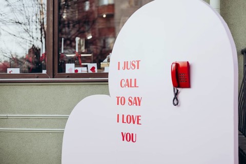 A Valentine's Day display featuring a red phone and the message I just call to say I love you, set