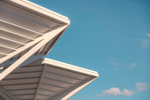 A close-up view capturing the intricate architectural design of a modern transport hub in