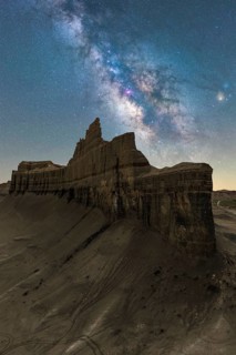 A mesmerizing night view capturing the Milky Way sprawling above the striking rock formations of
