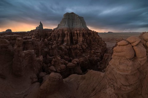 Captivating view of dramatic sandstone formations in Goblin Valley State Park, Utah, at dusk. The