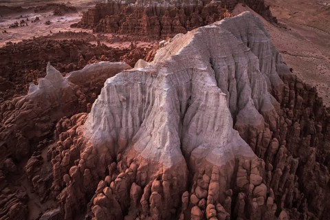 A majestic aerial shot capturing the unique rock formations of Goblin Valley State Park in Utah,