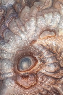 A stunning aerial view captures the intricate patterns and rich colors of bentonite sandstone in