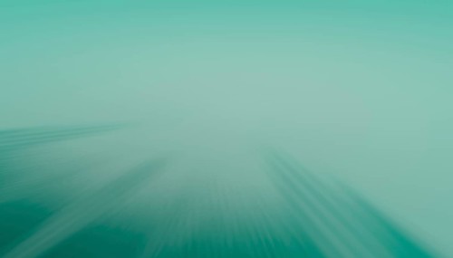 A serene 3D render of a radial blur converging towards the center, showcasing soothing tones of