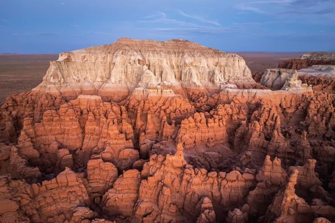 Captivating aerial view showcasing the striking, layered rock formations of Goblin Valley State