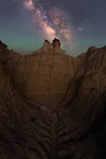 Captivating view of the Milky Way stretching above the unique sandstone formations in Goblin Valley