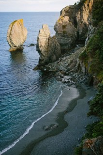 A breathtaking coastal view of Sherwink, Trinity, Newfoundland capturing the waves gently lapping