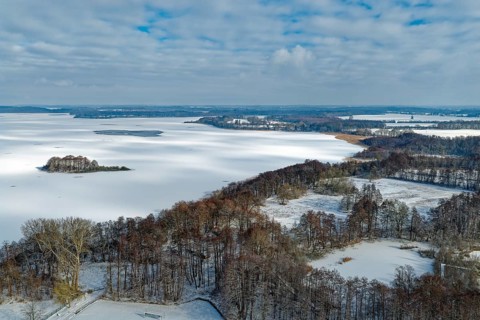 There is snow on the frozen Schaalsee near Zarrentin in the UNESCO Schaalsee Biosphere Reserve.