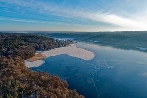 Lake Werbellin in the UNESCO Schorfheide-Chorin Biosphere Reserve with ice rinks in winter. aerial