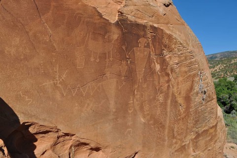 Petroglyphs of the Fremont culture on a large sandstone with ancient engravings, Dinosaur National