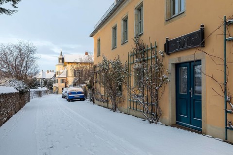 Historic wine house and the Meinholdschen Weingut and Meinholdsches Turmhaus in the snow, today