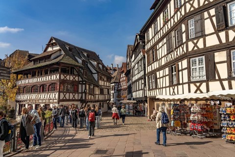 Half-timbered houses on Place Benjamin Zix and the Maison des Tanneurs in Petite France,