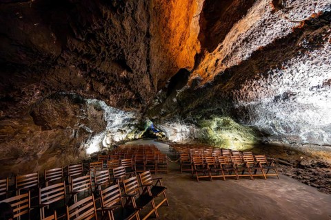 Underground cave formed by a lava flow, used as a concert hall, illuminated lava cave, Cueva de los