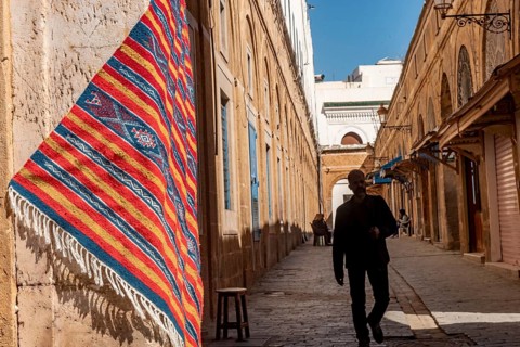 Tunis, Tunisia 4th May, 2024 A beautiful traditional woven rug hangs outside a shop in the souk of