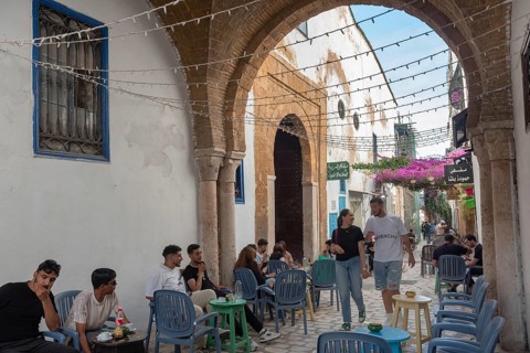 Tunis, Tunisia. 29th May 2024 Young Tunisians and tourists enjoy the café culture in the alleyways