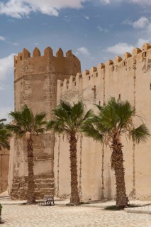 Tower and detail of the ancient city walls of the medieval Medina of Sfax on the Mediterranean