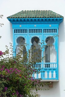 May 17th 2024. Sidi Bou Said, Tunisia. Window design detail of blue and white architecture part of