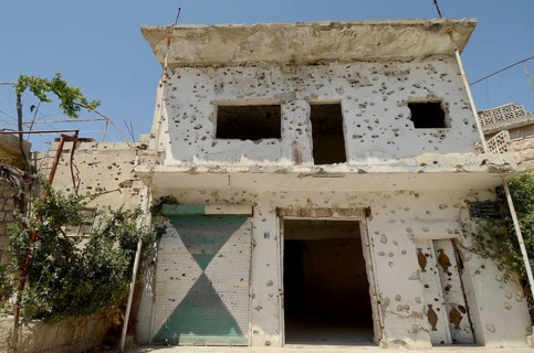Kafranbel, Idlib, Syria. June 21st 2013 A bullet riddled building in the war torn town of Kafra