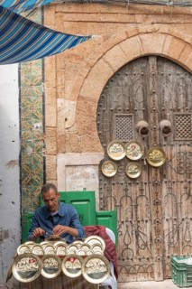 Tunis, Tunisia. 2nd May 2024 A local Tunisian craftsman at work in the Medina, a busy market