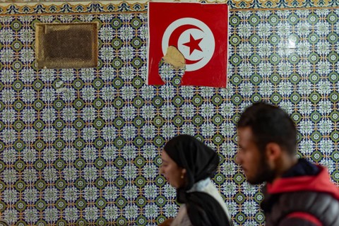 Tunis, Tunisia 2nd May, 2024 Typical Tunisian decorated wall of a restaurant with a Tunisian flag