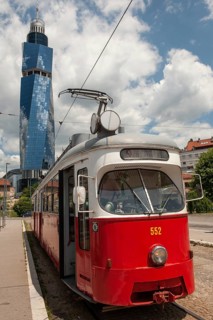 Sarajevo, Bosnia and Herzegovina July 25th 2019. An old tram waits at a tram stop with the Avaz