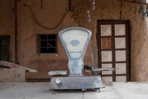 Siwa, Egypt, April 15th 2018 A dusty set of scales outside a closed shop in the Egyptian Oasis town