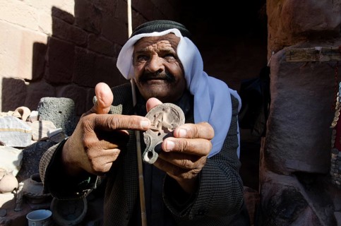 Petra, Jordan. December 13th 2012 Jordanian Bedouin selling artifacts to tourists Petra Jordan