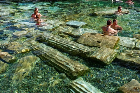 Pamukkale, Turkey, April 25th 2020 Foreign tourists enjoys the healing properties of thermal waters
