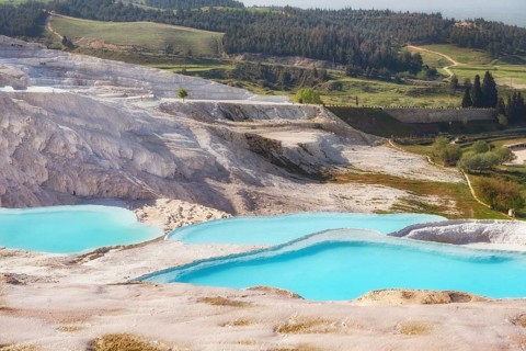 Pamukkale Travertine Terraces, amazing aqua blue pools of thermal mineral-rich spring water set