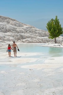 Pamakkule, Turkey, April 25th 2020 Tourists enter Travertine Terraces of Pamukkale the mineral rich