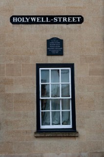 Oxford, England, UK. February 2nd, 2020 A window and plaque on Hollywell Street in the University