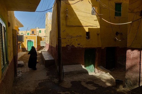 Aswan, Egypt. 10th January 2013 A local Muslim women walking in the narrow alleyways of a Nubian