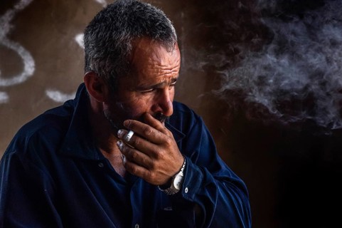 Tyre, Lebanon. July 16th 2010 A Lebanese farmer smoking in his village home, southern Lebanon